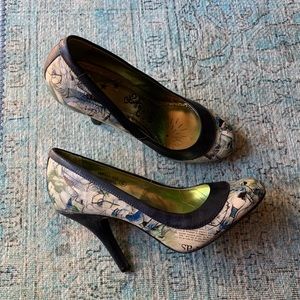 Naughty Monkey newspaper print heels